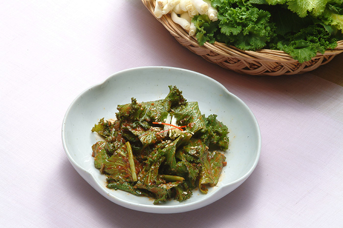 A mustard leaf side dish, or <i>gyeojaip namul</i>, is another spring dish served after Ipchun. 