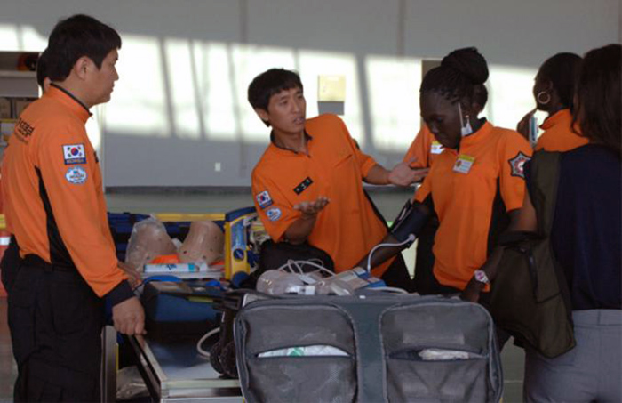 Public officers from Senegal practice how to conduct rescues at sea and how to deliver patients to hospitals using aircraft, during an education program offered by the National 119 Rescue Services.